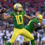 Oregon Stays in CFP Picture with fifty six-24 Win Over USC; National Championship Odds Improve from ...